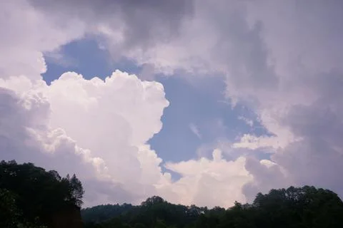 Blue Sky, Clouds Formation and Silhouette Before Rain Fell Stock Photos