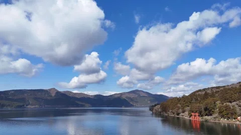 Blue Sky &amp; Clouds | Lake Ashi | Hakone - 4K Aerial Video Stock Footage 333196015