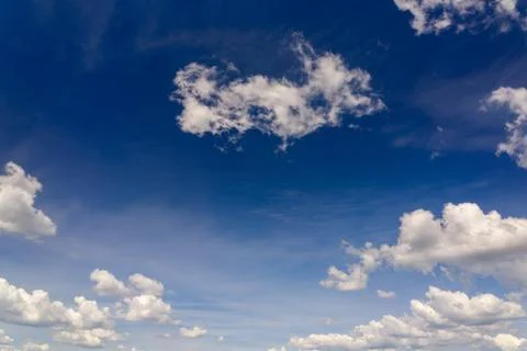 A blue sky with clouds at noon. Foto stock