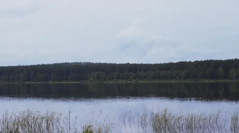 Blue sky with clouds over Lake Stock Footage 56058056