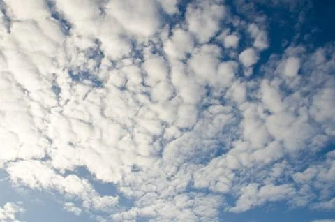 Blue sky with clouds Stock Photos