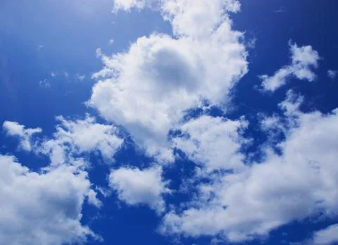 Blue sky with clouds. Stock Photos