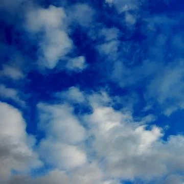 The blue sky with clouds Stock Photos