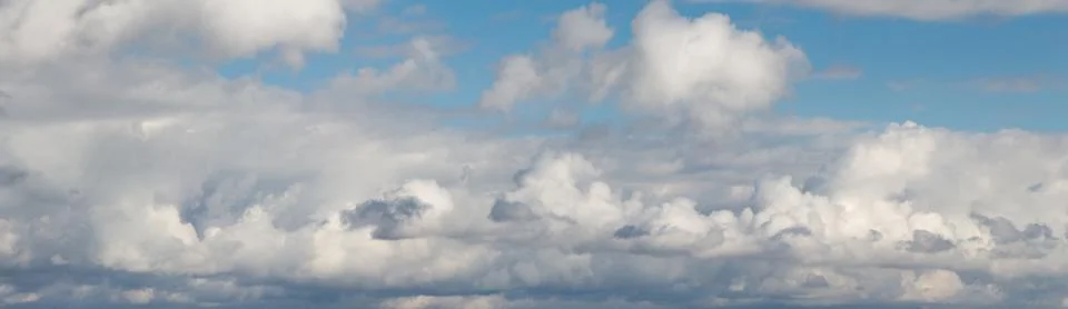 Blue sky with clouds Stock Photos