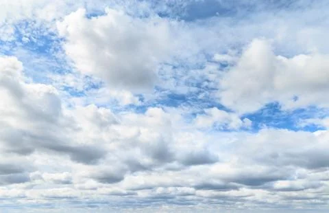 Blue sky with clouds. Stock Photos