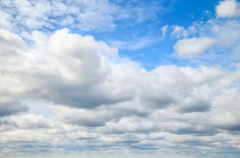 Blue sky with clouds. Stock Photos