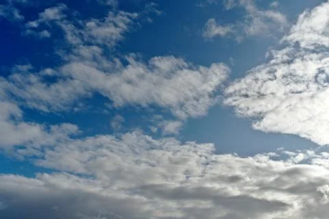 Blue sky with clouds Stock Photos