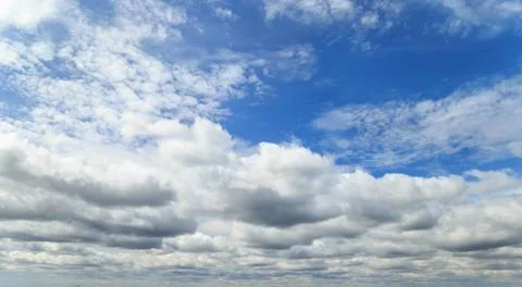 Blue sky with clouds. Stock Photos