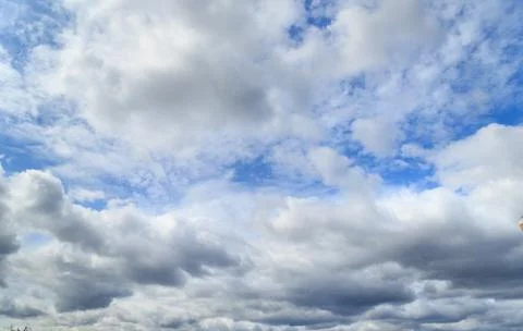 Blue sky with clouds. Stock Photos