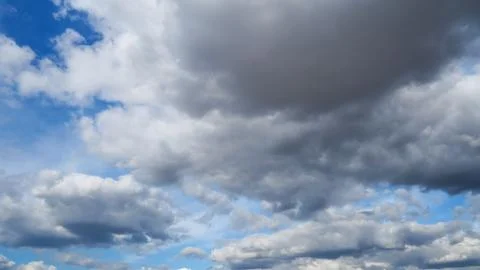 Blue sky with clouds. Stock Photos