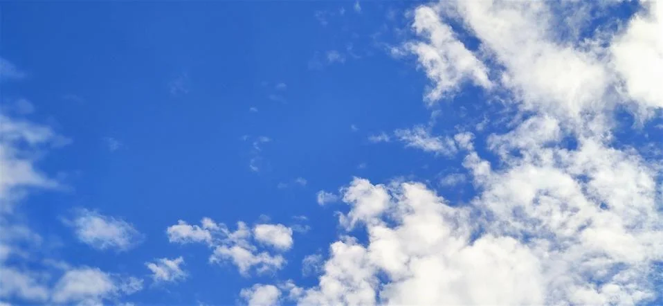 Blue sky with clouds Stock Photos