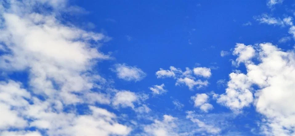 Blue sky with clouds Stock Photos