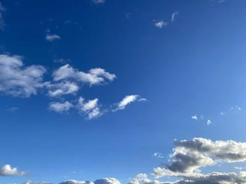 Blue sky with clouds Stock Photos