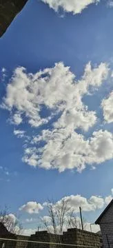 Blue sky with clouds Stock Photos