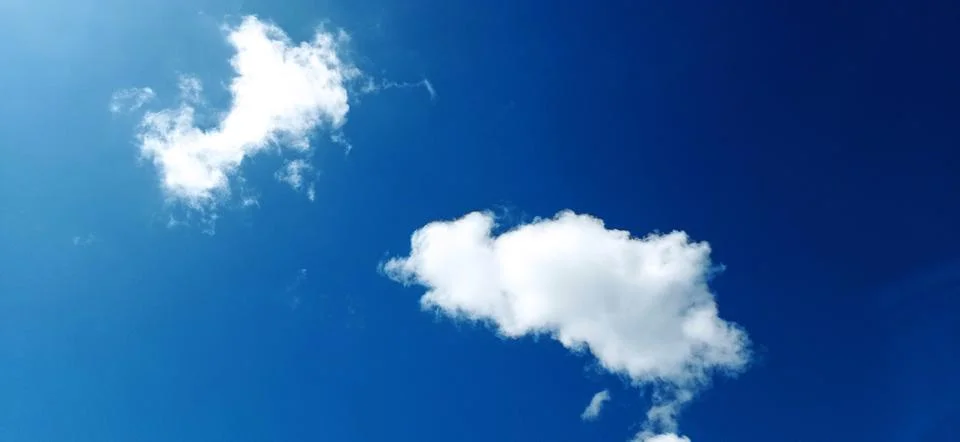 Blue sky with clouds Stock Photos
