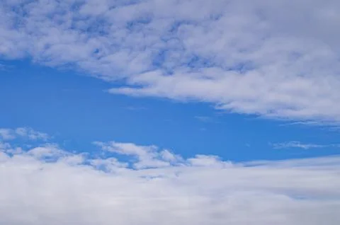 Blue sky with clouds Stock Photos