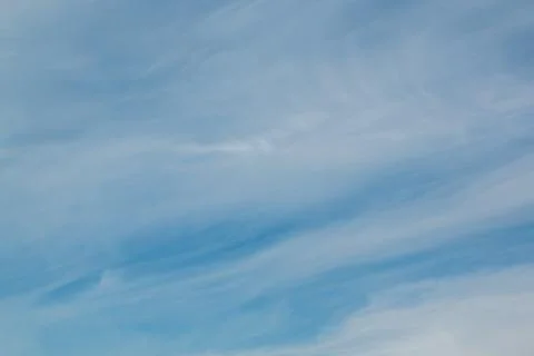 A blue sky with clouds Stock Photos