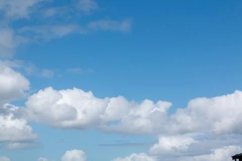 A blue sky with clouds Stock Photos