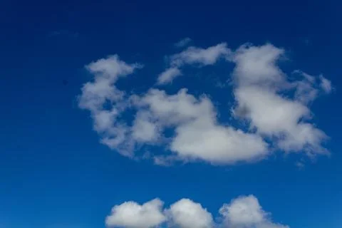 A blue sky with clouds Stock Photos
