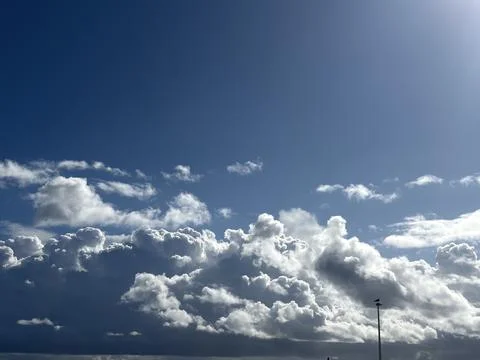 Blue sky with clouds Stock Photos
