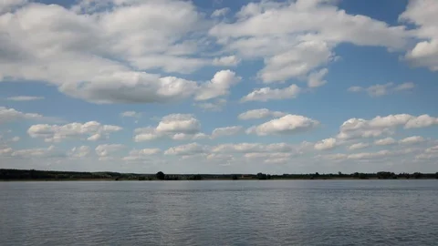 Blue sky, clouds, river timelapse Stock Footage 91698486