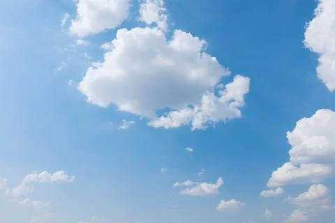 Blue sky with clouds, sky background Фото