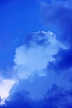 Blue sky with clouds before the storm. Stock Photos
