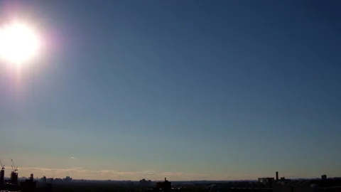 Blue Sky with Clouds Time-lapse and Sun GT5031 Stock Footage 162397280