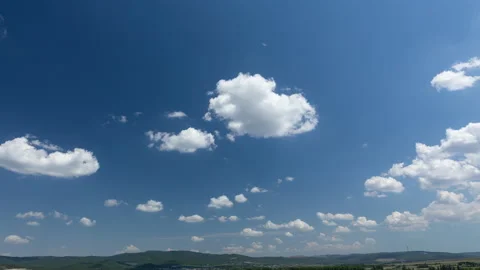Blue sky with clouds. Time lapse of clouds in blue sky 4k Stock Footage 204982573