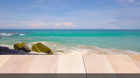 Blue sky with clouds with waves rolling onto an island beach Stock Footage 139145467