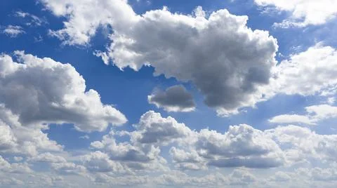 Blue sky with cloudscape clouds. Summer sky holds white clouds. Open sky ca.. Stock-Fotos