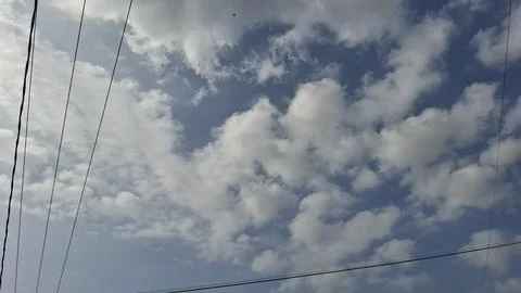 Blue Sky Cloudscape with Soft White Clouds Stock Photos