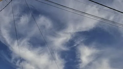 Blue Sky Cloudscape with Soft White Clouds Stock Photos