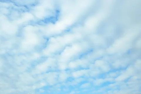 Blue sky with cloudy haze. Celestial atmospheric background Stock Photos