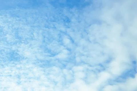 Blue sky with cloudy haze. Celestial atmospheric background Stock Photos