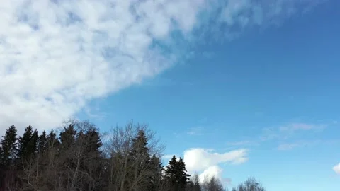 Blue Sky To Cloudy Sky Drone Pan Stock Footage 174168802