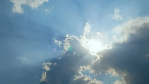 Blue sky cloudy with sun light beam with bird flying with natural sound Stock Footage 133568189