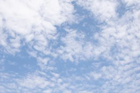 Blue sky is covered by white clouds Stock Photos