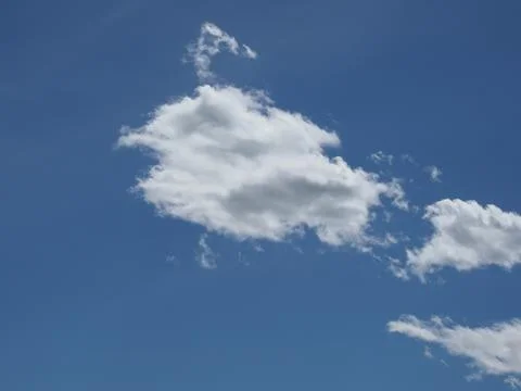 Blue sky with cumulus cloud Stock Photos