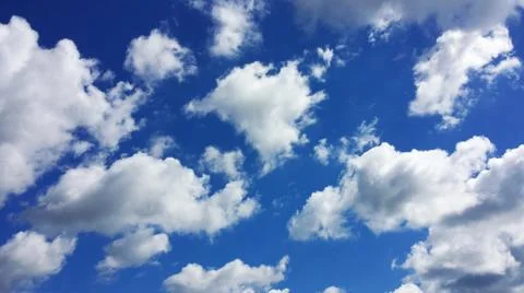 Blue sky with cumulus clouds Stock Photos