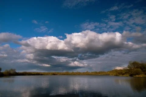Blue sky, Cumulus clouds Stock Photos