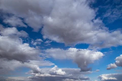 Blue sky, Cumulus clouds Stock Photos