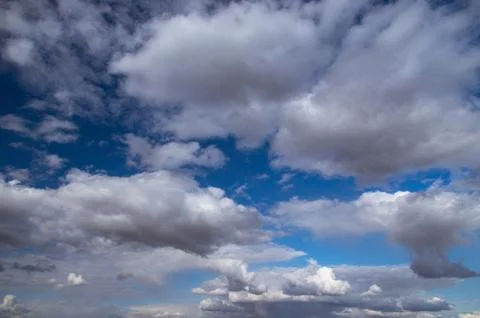 Blue sky, Cumulus clouds Stock Photos