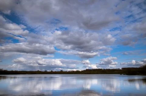 Blue sky, Cumulus clouds Stock Photos