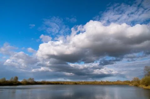 Blue sky, Cumulus clouds Stock Photos
