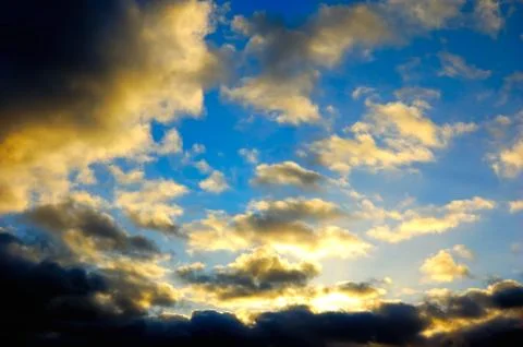 The blue sky with dark clouds Stock Photos
