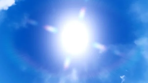 Blue sky day with bright sun shining through Stock Footage 77951178