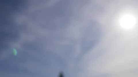 Blue sky day with bright sun shining bright Video stock 83138923