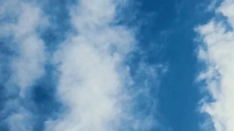 Blue sky dotted with white clouds Video stock 237643274