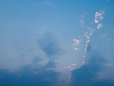 Blue Sky with Dramatic Cloud Formation and Sunlit Atmosphere Stock Photos